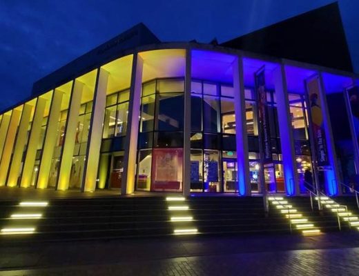 A photo of Marlowe Theatre at night