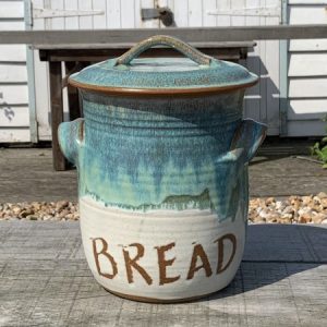 A blue and white pot labelled 'bread'